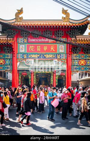 Tourists celebrate Chinese New Year at a Chinese Temple in China Town, Bangkok Thailand. Stock Photo