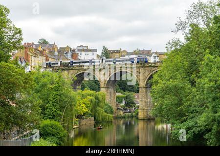 Northern railway train crossing Knaresborough viaduct, Knaresborough, North Yorkshire, England, UK Stock Photo