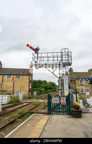 Semaphore signal set at proceed Knaresborough railway station, Knaresborough, North Yorkshire, England, UK Stock Photo