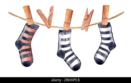 Watercolor striped socks are dried on a rope. Wooden clothespins. Horizontal banner for halloween Stock Photo