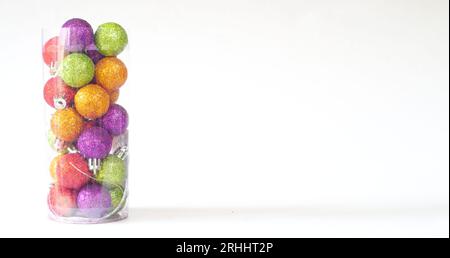 glittering multicolored christmas balls on white background, merry christmas,christmas ddecoration, free copy space Stock Photo