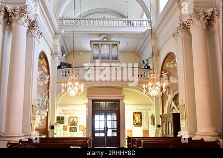 Vienna, Austria. Collegiate Church of the Holy Cross on Mariahilfer Strasse. The organ of the collegiate church comes from Franz Ullmann Stock Photo