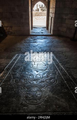 Beja, Portugal - Jul 27th, 2023: Tombstone of Afonso Vaz Viegas, Beja Castle. Most emblematic monument of the city Stock Photo