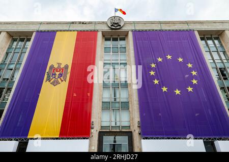 Large flags of Moldova and the European Union on the building of the Government of Moldova Stock Photo