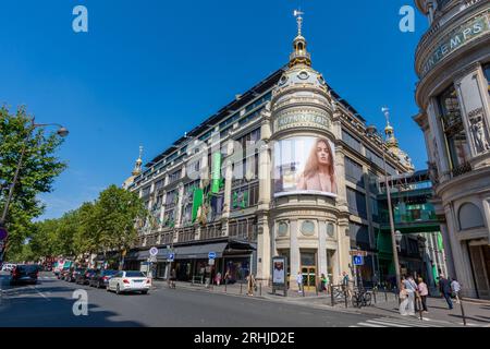 Burberry Goddess perfume advertising billboard covering the facade of the Printemps Haussmann, famous department store of Paris, France Stock Photo