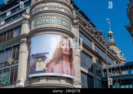 Burberry Goddess perfume advertising billboard covering the facade of the Printemps Haussmann, famous department store of Paris, France Stock Photo