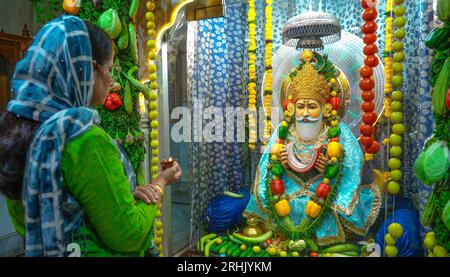 jhulelal god in river sitting on a fish