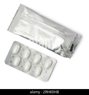 white tablets in blister pack with foil cover, medical drugs for allergies, antibiotic, pain relievers, packages for tablets isolated on white Stock Photo