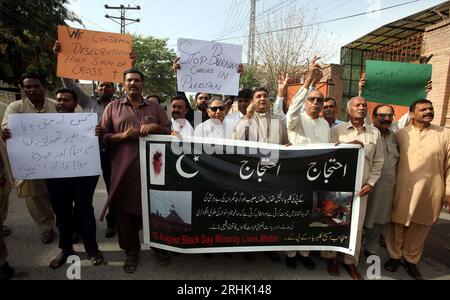 Hyderabad, Pakistan, August 17, 2023. Members of Christian Community are holding protest demonstration against attack on churches in Jaranwala, at Peshawar press club on Thursday, August 17, 2023. Stock Photo