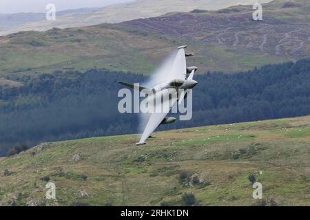 RAF Typhoon Eurofighter practising low flying at the Mach Loop area in Wales Stock Photo