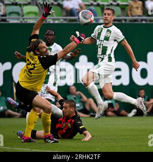 Budapest, Hungary. 31st August, 2023. Barnabas Varga of Ferencvarosi TC  competes for the ball with Nassim Hnid of FK Zalgiris Vilnius during the  UEFA Europa Conference League Play Off Round Second Leg