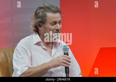 Farnborough, Hants, UK. 17th Aug, 2023. Scenes on the first day of the British Motor Show on Farnborough International Airport. Our picture shows: Personality motoring guru and editor Mike Rutherford Credit: Motofoto/Alamy Live News Stock Photo