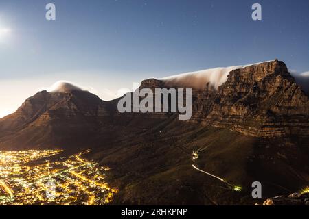Night-scape landscape photograph of Table Mountain and Cape Town City South Africa from Lions Head and Signal Hill travel tourism Stock Photo