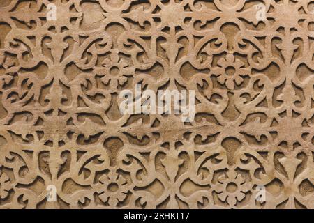 Floral shape ornamental stone building facade in Segovia, Spain, Mediterranean architecture, leaves and flower pattern. Stock Photo