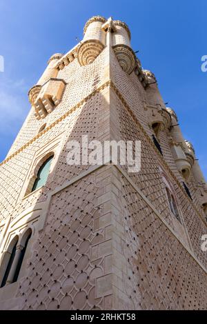 Tower of John II of Castile in the Alcazar of Segovia, Spanish Gothic architecture facade with islamic ornaments, low angle view. Stock Photo