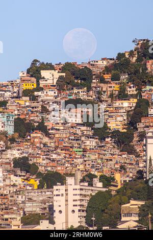 full moon and the Vidigal community in Rio de Janeiro. Stock Photo