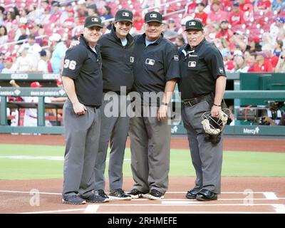 St. Louis, United States. 04th Aug, 2021. Major League Umpires (L to R)  Todd Tichenor, Dan Merzel, John Tumpane and Marvin Hudson pose for a  photograph before the start of the Atlanta