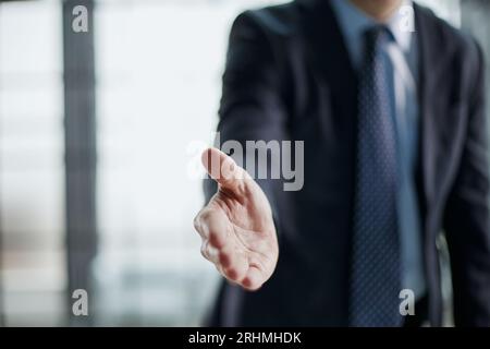 Make deal, company boss HR recruiter greet applicant starting job interview concept. Stock Photo