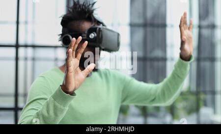 A man is looking for bright impressions using gadgets. Stock Photo