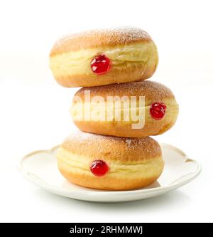 freshly baked jelly donuts isolated on white background Stock Photo