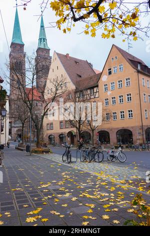 Nuremberg cityscape. Old town of Nuremberg with church of St. Sebald. Nuremberg historical downtown street. Bicycles on city streets. Urban citylife. Stock Photo