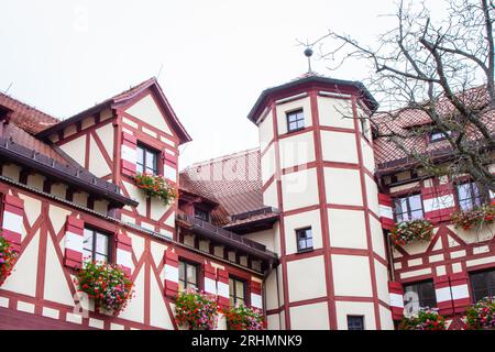 Bavarian traditional houses called fachwerkhaus. Medieval architecture. Nuremberg landmark. Half-timbered houses. Stock Photo