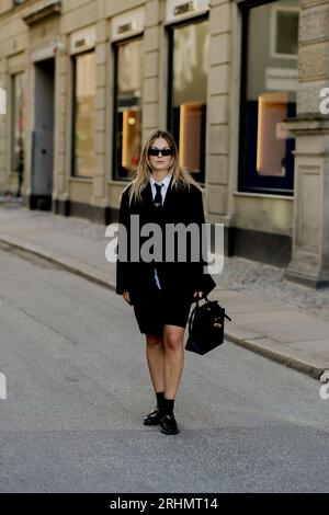 Copenhagen, Denmark. 10th Aug, 2023. Street style, arriving at Rotate Spring-Summer 2024 show, during Copenhagen Fashion Week, Denmark, on August, 2023. Photo by Marie-Paola Bertrand-Hillion/ABACAPRESS.COM Credit: Abaca Press/Alamy Live News Stock Photo