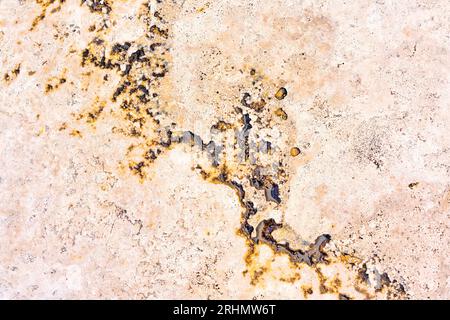 Abstract textured concrete flooring background with water Stock Photo