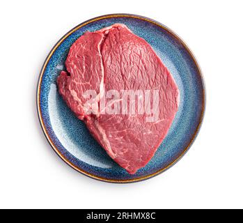 Raw fillet steak beef meat on plate isolated on the white background. Stock Photo