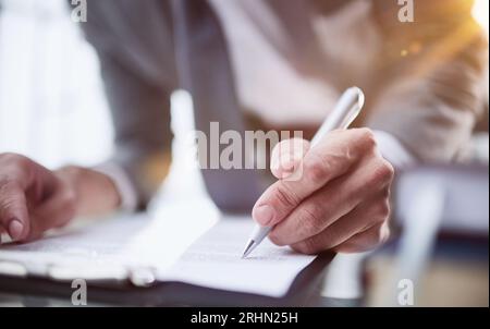 executive ceo manager writing notes in notebook at workplace. Stock Photo