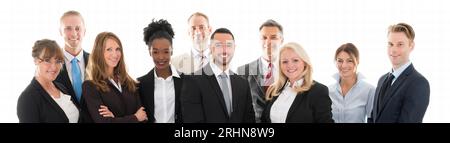 Full length portrait of confident business team standing against white background Stock Photo