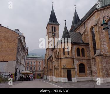 Sacred Heart Cathedral Church and surrounding buildings in the city Sarajevo, Bosnia and Herzegovina, August 18,2023. Stock Photo