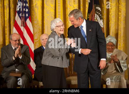 HARPER LEE (1926-2016) The American novelist being awarded the Presidential Medal of Freedom by President George Bush, 5 November 2007 Stock Photo