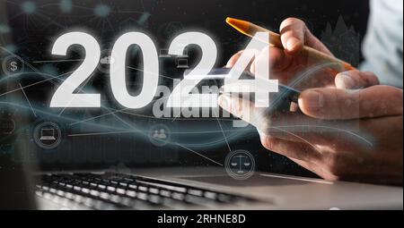 New Year 2024 business plan, strategies, goal, development and success.  Stock Photo