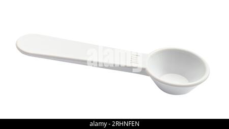 white plastic measuring spoon for 1 ml of volume cutout on white background Stock Photo