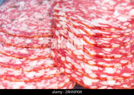 close-up of smoked sausage of two different types, sliced, full frame. ready-made food, quick food for breakfast, snack. Stock Photo