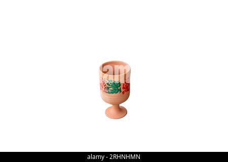 Painted clay wine glass isolated on a white background. Stock Photo