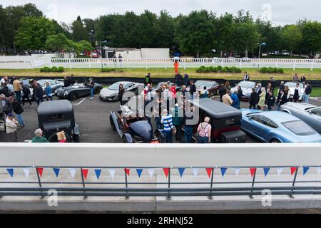 Cars lined up on track at Rule Britannia Breakfast Club Meeting to celebrate the Queen's Platinum Jubilee,Goodwood motor racing circuit,Chichester,UK Stock Photo