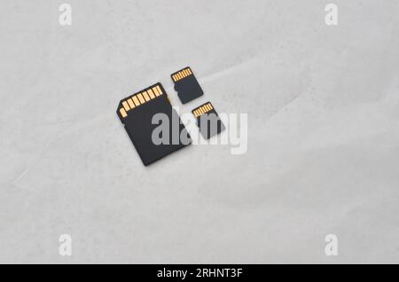 Close up of SD and microSD cards, symbols of compact and efficient storage on chips. Detail of SD and microSD cards, representing the modern concept o Stock Photo