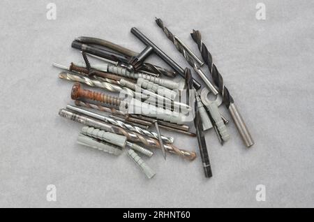 Close-up of drill bits with screws ready for work, representing efficiency in construction. Set of close-up drills, perfect for representing precise w Stock Photo