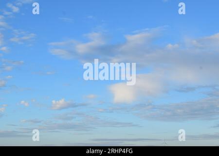 light clouds in blue sky Stock Photo