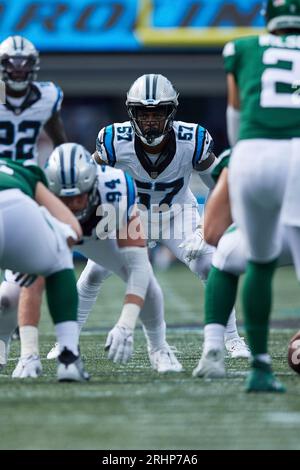 Carolina Panthers linebacker Chandler Wooten (50) battles with Denver  Broncos linebacker Justin Strnad (40) on special teams during an NFL  football game, Sunday, Nov. 27, 2022, in Charlotte, N.C. (AP Photo/Brian  Westerholt