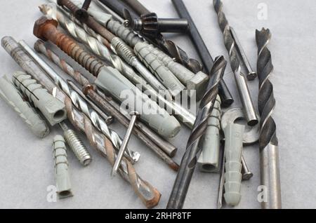 Close-up of drill bits with screws ready for work, representing efficiency in construction. Set of close-up drills, perfect for representing precise w Stock Photo