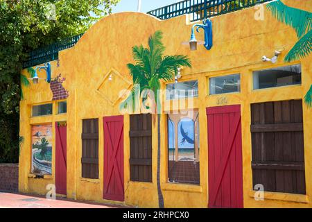 Key West, Florida, USA. Colourful facade of the Blue Macaw, a popular cocktail bar, Bahama Village, Old Town. Stock Photo