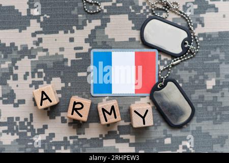 Amy camouflage uniform with flag on it, France Stock Photo