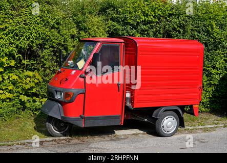 Germany, Bavaria, Upper Bavaria, Altötting, three-wheeled van, red, Piaggio Ape 50 box Stock Photo