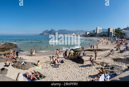 Rio de Janeiro, Brazil: Ipanema beach and city skyline from Arpoador rock, small peninsula between Ipanema and Copacabana, with The Dois Irmaos view Stock Photo