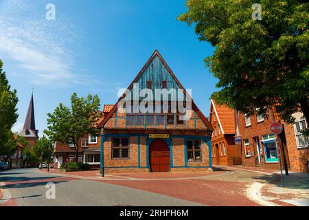 Tea trading station, in the background the St. Severi church, Otterndorf Stock Photo