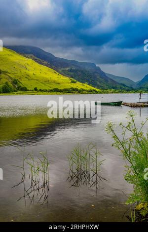 Storm clouds gather over Tal y Lyn Lake nr Tywyn, Gwynedd, Wales, UK Stock Photo