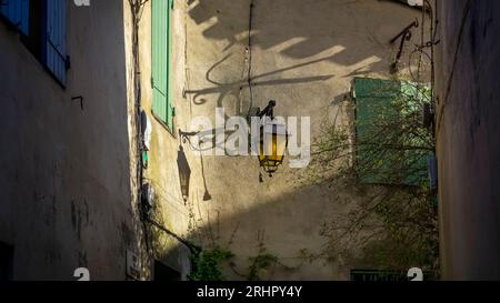 Street lamp in Bages. The commune is located in the Regional Natural Park Narbonnaise en Méditerranée. Stock Photo